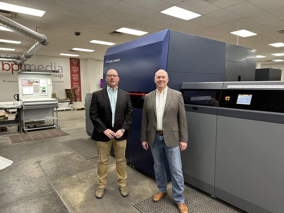 Owners of BPI Media Group with their newly installed Konica Minolta AccurioJet KM-1e LED UV Inkjet Press. (L) Steve Davis, Vice President; Alan Davis, President (R)