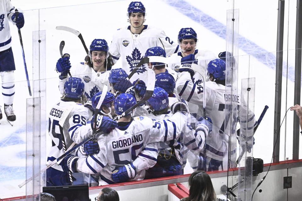 Toronto players celebrate winning the NHL Global Series Sweden ice hockey match between Toronto Maple Leafs and Minnesota Wild at Avicii Arena in Stockholm, Sweden, Sunday, Nov. 19, 2023. (Claudio Bresciani/TT via AP)