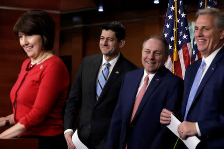 Rep. Cathy McMorris Rodgers (R-WA), House Speaker Paul Ryan (R-WI), House Majority Whip Steve Scalise (R-LA), and House Majority Leader Kevin McCarthy (R-CA) attend a news conference with Republican leaders after their closed conference on Capitol Hill in Washington, U.S., February 14, 2018. REUTERS/Yuri Gripas