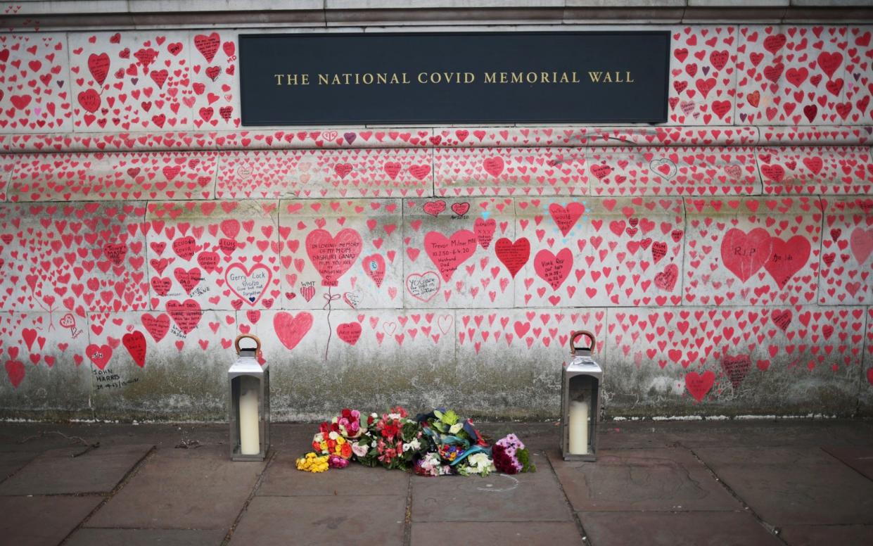 The National Covid Memorial Wall in London - REUTERS/Hannah McKay