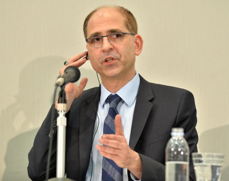 Novartis Pharmaceuticals Division Head David Epstein answers questions during a press conference in Tokyo, on April 3, 2014