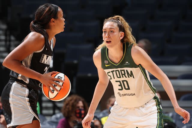 <p>David Sherman/NBAE via Getty</p> Breanna Stewart #30 of the Seattle Storm plays defense on Napheesa Collier