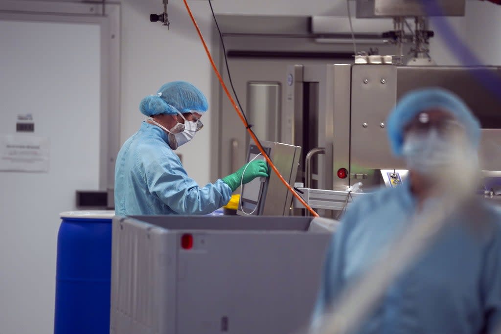 Staff work in a laboratory at Oxbox Biomedica (Steve Parsons/PA) (PA Wire)