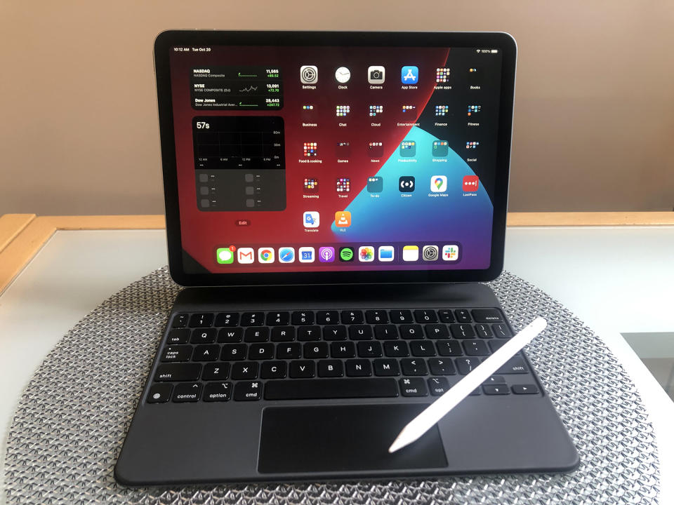 A head-on view of Apple's 2020 iPad Air, with the Magic Keyboard accessory and optional second-generation Apple Pencil.