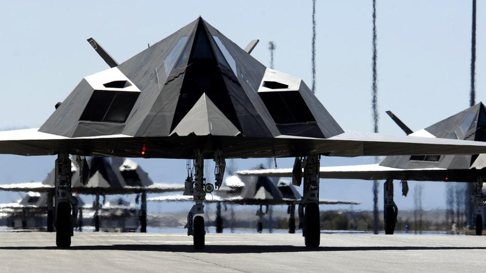 Twenty-five F-117 Nighthawks line up waiting for takeoff from Holloman Air Force Base, NM The planes were part of a formation celebrating Nighthawk's 25th anniversary/250,000 flying hour here.  The 25 plane were separated into 5 groups and flew over the base to end the celebration ceremony.
(U.S. Air Force photo/Senior Airman Brian Ferguson)