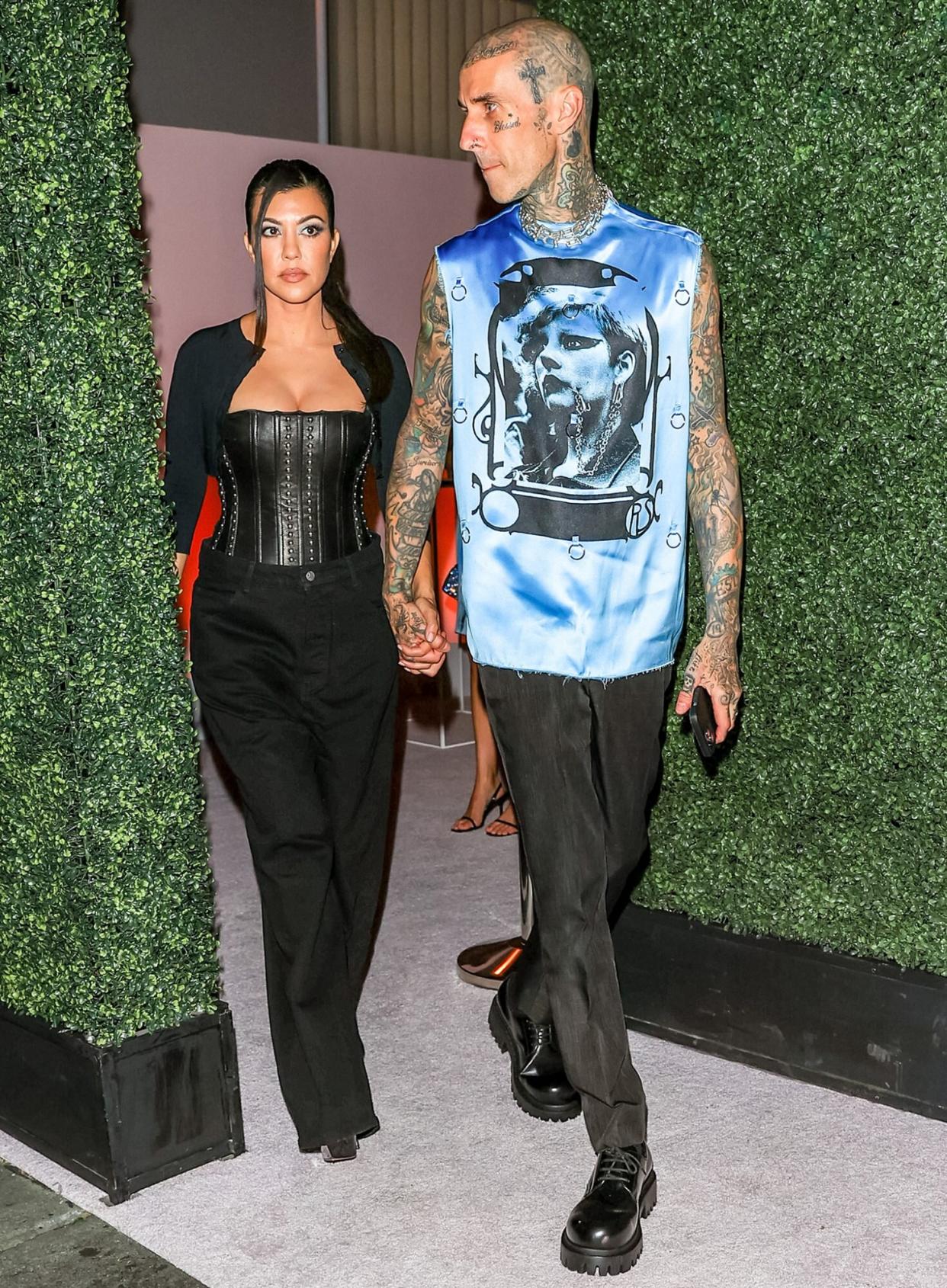Kourtney Kardashian and Travis Barker are seen on August 24, 2022 in Los Angeles, California