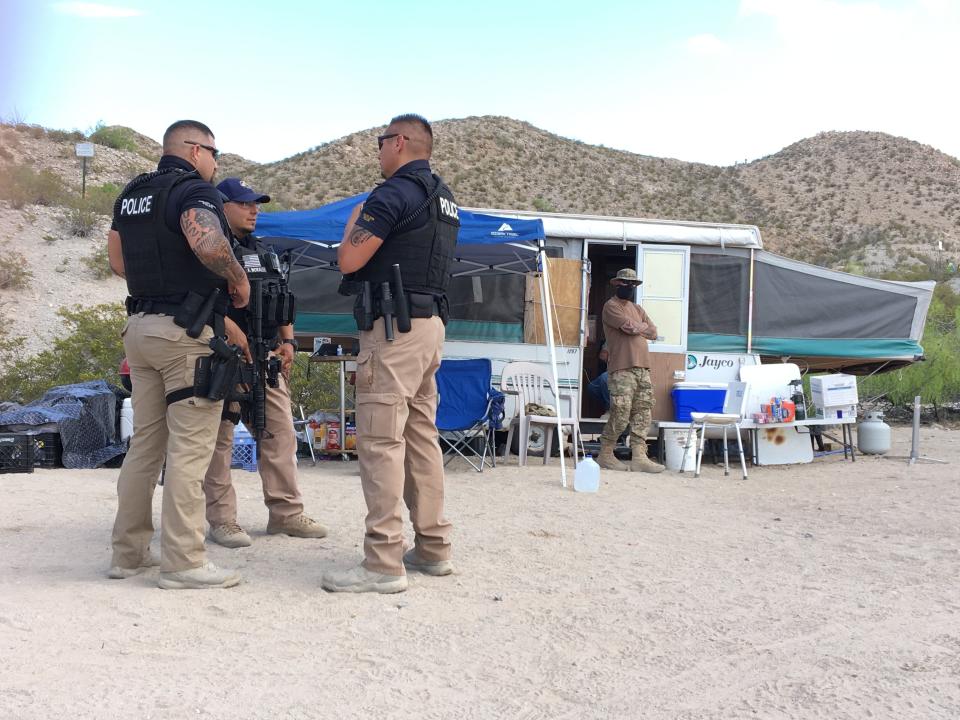 The United Constitutional Patriots-New Mexico Border Ops group were visited by law enforcement Monday as they erected 'No Trespassing' signs denoting the city of Sunland Park's boundary near their camp. Union Pacific Police said they are camped on railroad land and will need to vacate by Friday.