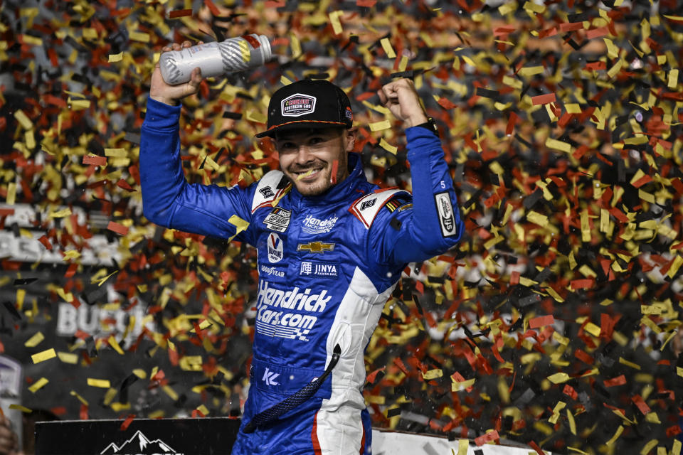 Kyle Larson celebrates in Victory Lane after winning a NASCAR Cup Series auto race at Darlington Raceway, Sunday, Sept. 3, 2023, in Darlington, S.C. (AP Photo/Matt Kelley)