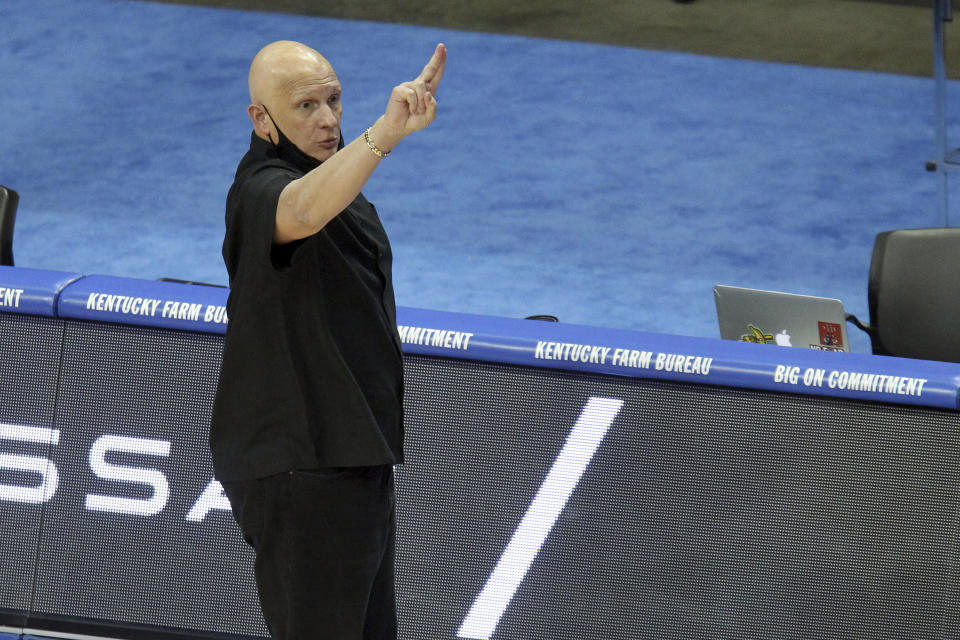 South Carolina head coach Frank Martin calls a play during the first half of an NCAA college basketball game against Kentucky in Lexington, Ky., Saturday, March 6, 2021. (AP Photo/James Crisp)