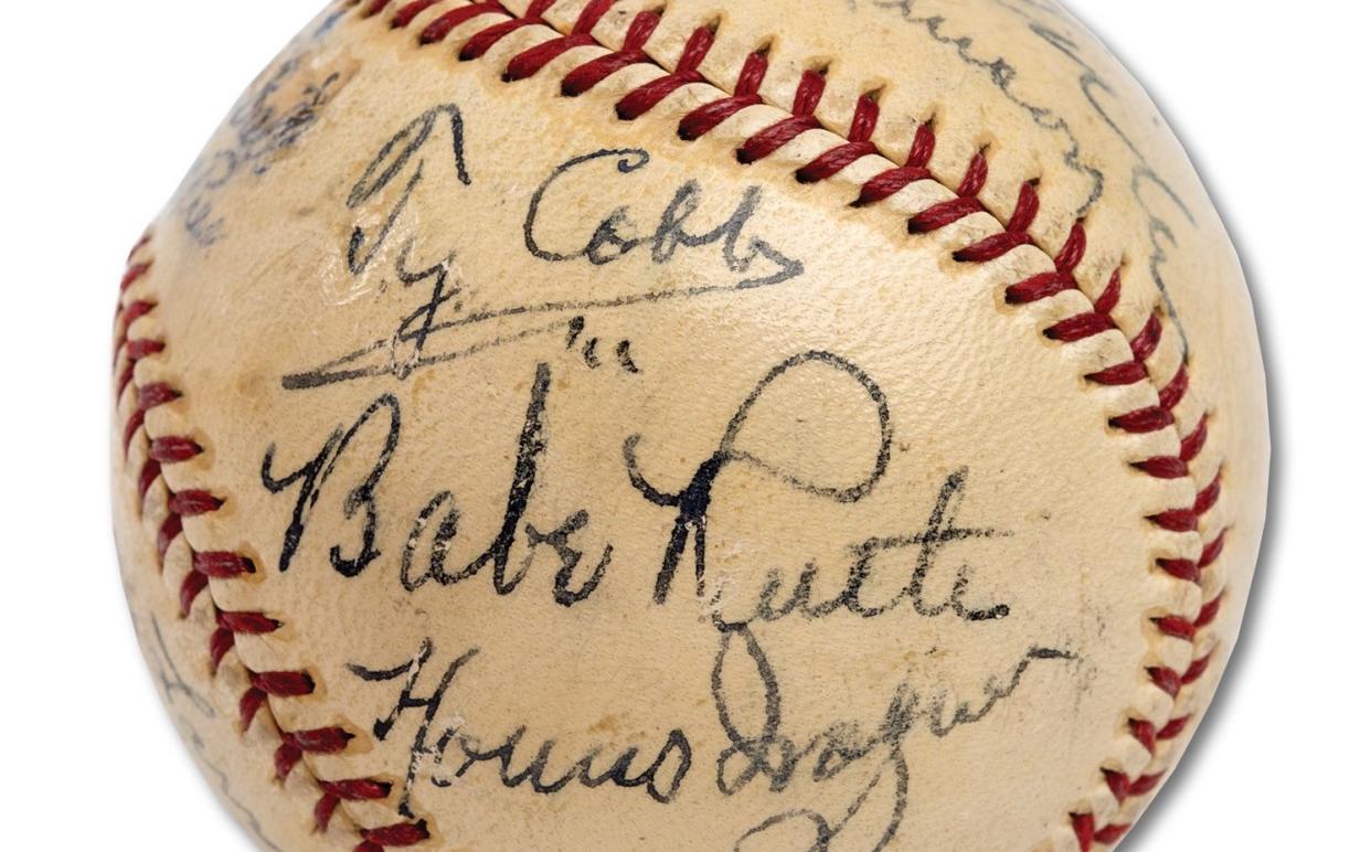 A baseball featuring 11 signatures from honorees at the first Hall of Fame induction ceremony in 1939 sold at auction for a record amount. Babe Ruth, Honus Wagner, Ty Cobb and other legends of early baseball signed the ball. (SCP Auctions)