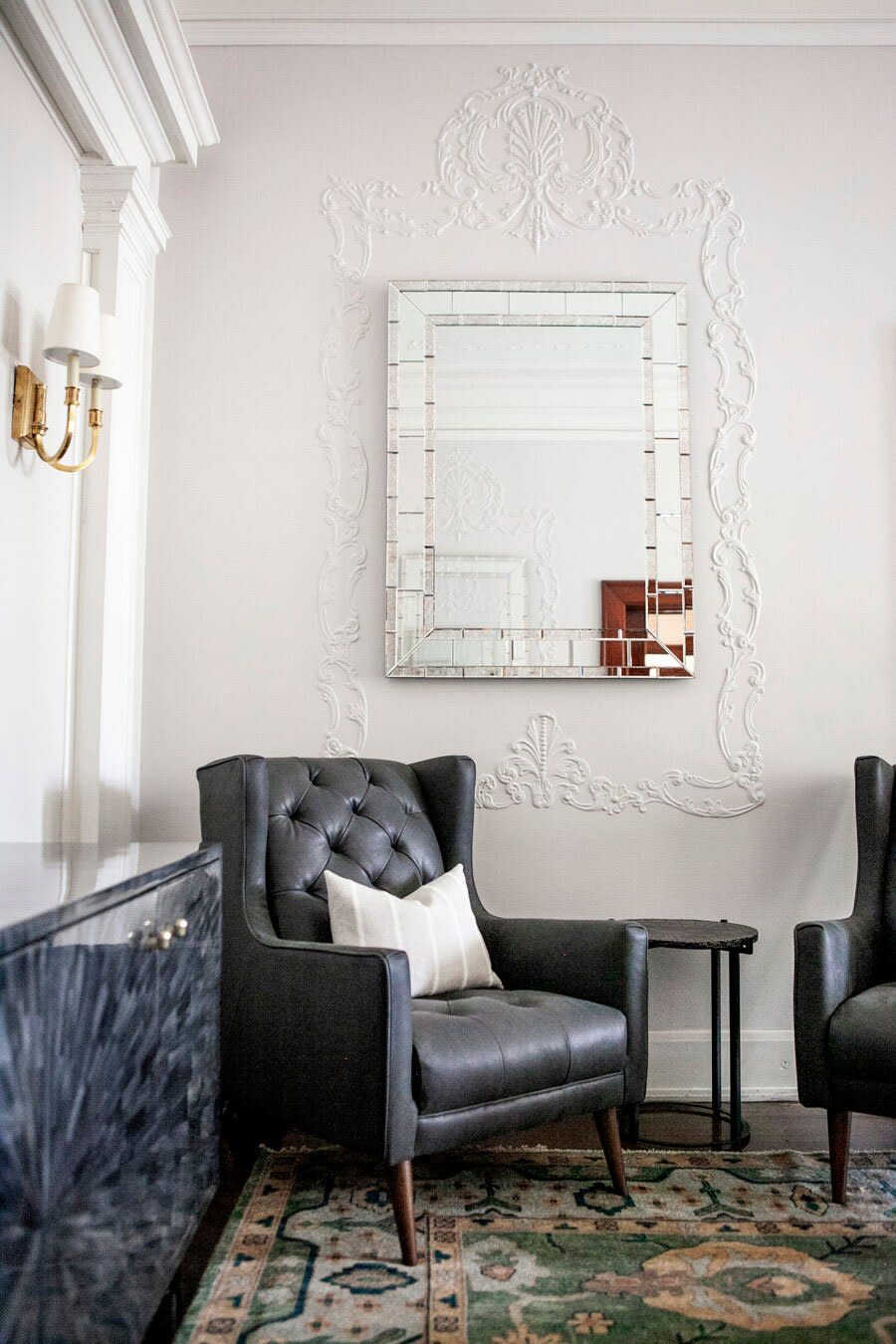 Sitting Area with Black Leather Chair