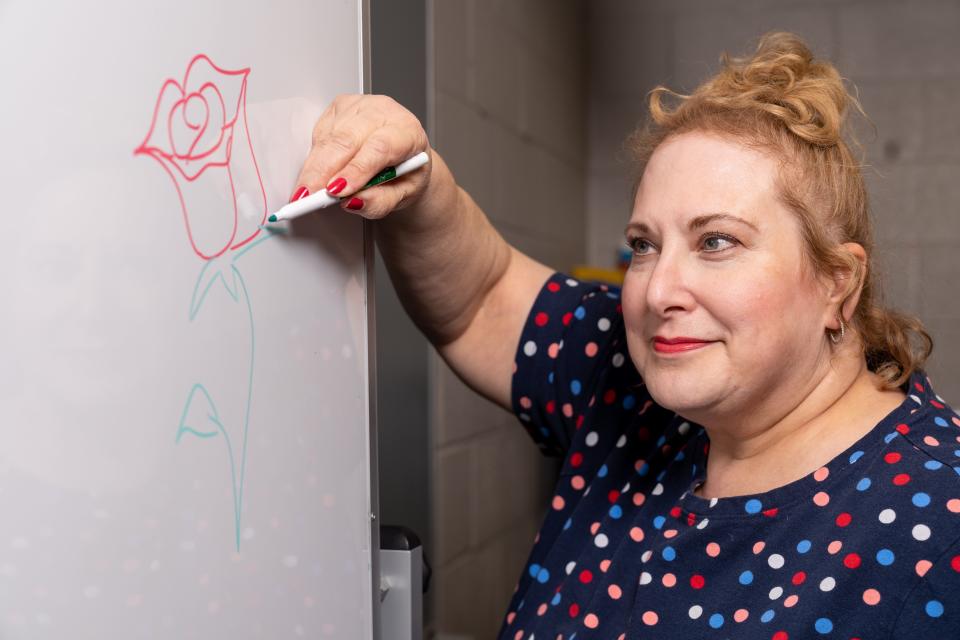 Rhonda Sherbin, a teacher for more than three decades, is known for the roses she draws for her students.