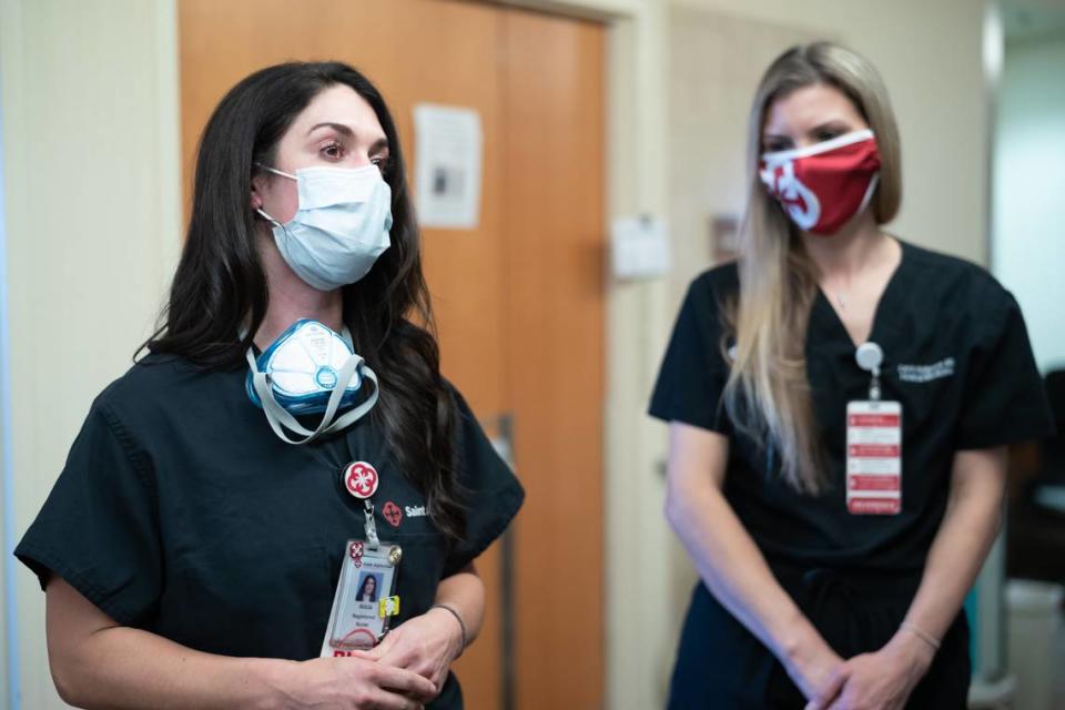 Alicia Luciani, a registered nurse, and Dr. Carolyn McFarlane recall young, healthy patients who died of COVID-19. They spoke Thursday at Saint Alphonsus in Boise.