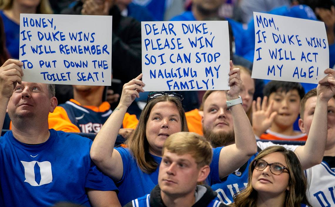 A family of Duke fans, share a variety of personal promises in exchange for a victory in the ACC Championship game on Saturday, March 11, 2023 at the Greensboro Coliseum in Greensboro, N.C.