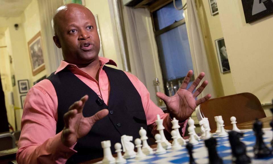 <span>Maurice Ashley speaks after his induction to the US Chess Hall of Fame in 2016. </span><span>Photograph: Mark Lennihan/AP</span>