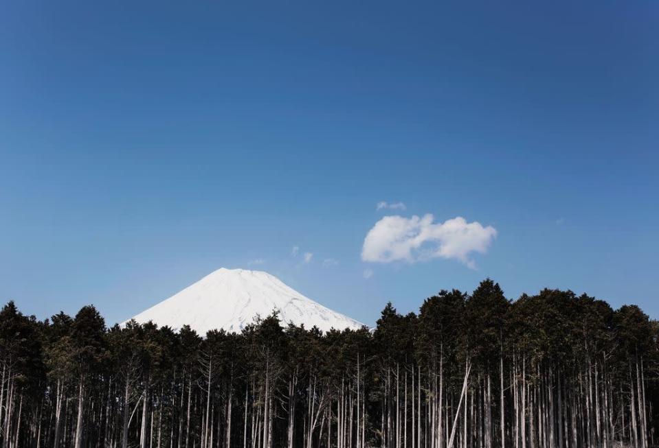 JAPAN: A scene depicting Mount Fuji and the surrounding landscape in Izu, Japan.