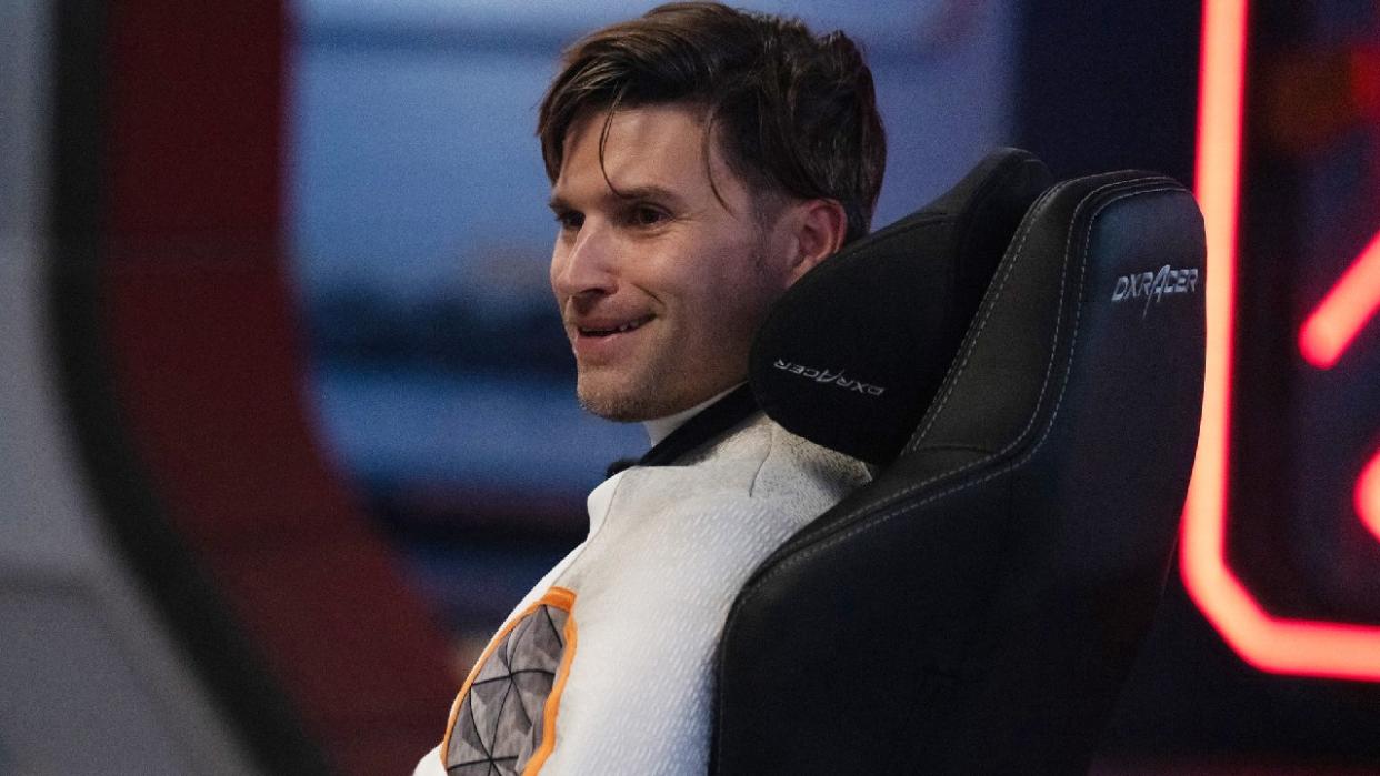  Tom Schwartz sitting in a chair on Stars On Mars 