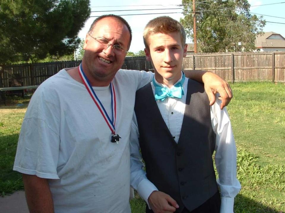 Norman Masters poses for a photo with his oldest son Josh Sepanski before his junior prom at the “shack” where they lived in Rio Linda. Sepanski said it was the second year he had been allowed to attend school. He is now 27.