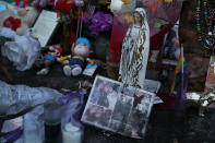 <p>Personnel items are seen in a memorial to the victims of the mass shooting setup around the Pulse gay nightclub one day before the one year anniversary of the shooting on June 11, 2017 in Orlando, Florida. (Joe Raedle/Getty Images) </p>