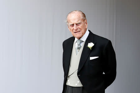 FILE PHOTO: Britain's Prince Philip waits for the bridal procession following the wedding of Princess Eugenie of York and Jack Brooksbank in St George's Chapel, Windsor Castle, near London, Britain October 12, 2018. Alastair Grant/Pool via REUTERS/File photo