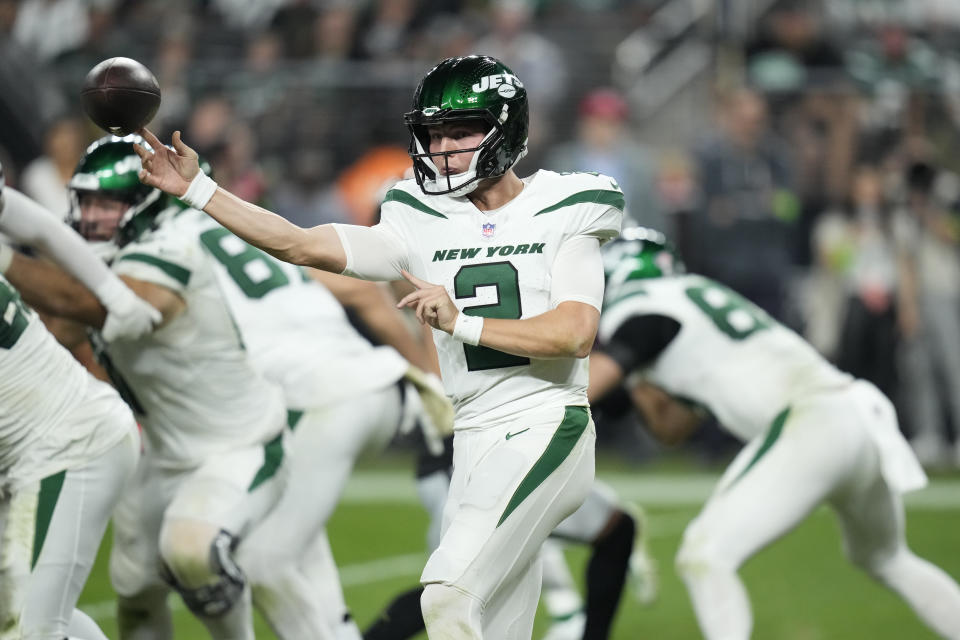 New York Jets quarterback Zach Wilson throws during the second half of an NFL football game against the Las Vegas Raiders Sunday, Nov. 12, 2023, in Las Vegas. (AP Photo/John Locher)