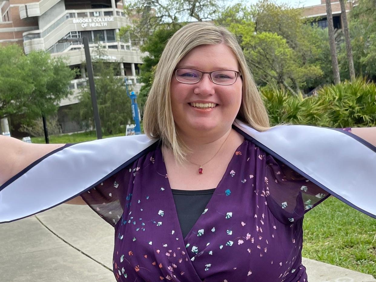 Emily Elizabeth Adkins is shown in 2021 on the day she graduated from UNF with a degree in health administration. At 23, she died suddenly last year due to a pulmonary embolism stemming from an undetected blood clot that developed after the young woman broke her ankle.