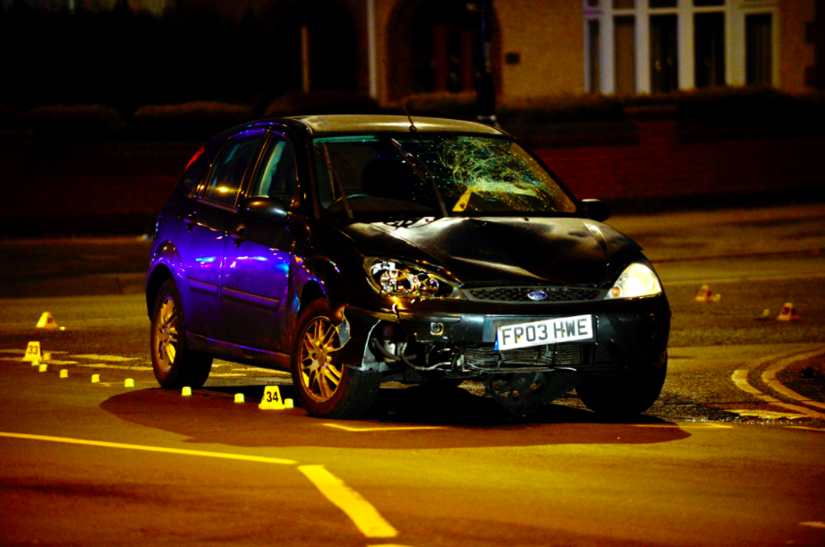 <em>A black Ford Focus with a smashed windscreen and deployed airbags was abandoned in nearby Longfellow Road a short time after Corey and Casper Platt-May were killed (SWNS)</em>