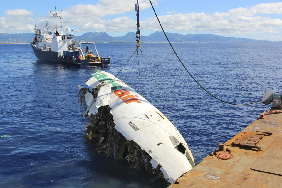 FILE - In this photo provided by the National Transportation Safety Board, the forward section of the fuselage of TransAir flight 810 is recovered from the Pacific Ocean near Honolulu on Oct. 20, 2021. Federal investigators said Thursday, June 15, 2023, that the cargo plane ditched into the ocean off Hawaii in 2021 was because pilots identified the wrong engine that was failing and didn’t have enough power to remain airborne. (Clint Crookshanks/National Transportation Safety Board via AP, File)