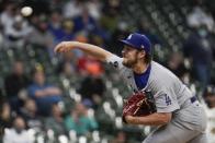 Los Angeles Dodgers starting pitcher Trevor Bauer throws during the first inning of a baseball game against the Milwaukee Brewers Thursday, April 29, 2021, in Milwaukee. (AP Photo/Morry Gash)