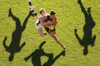 Robin Nahas of the Tigers is tackled during the round 23 AFL match between the Richmond Tigers and the Port Adelaide Power at the Melbourne Cricket Ground on September 2, 2012 in Melbourne, Australia. (Photo by Scott Barbour/Getty Images)