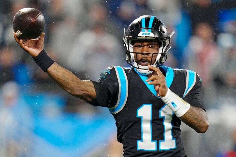 Former Carolina Panthers quarterback PJ Walker passes against the Atlanta Falcons during the first half of an NFL football game on Thursday, Nov. 10, 2022, in Charlotte, N.C. (AP Photo/Rusty Jones)