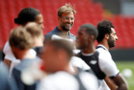 Soccer Football - Champions League - Liverpool Training - Anfield, Liverpool, Britain - May 21, 2018 Liverpool manager Juergen Klopp and Mohamed Salah during training Action Images via Reuters/Carl Recine