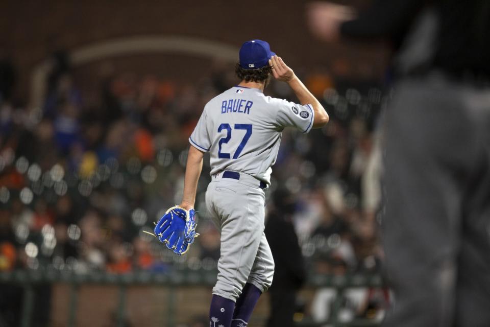 Trevor Bauer gestures to the crowd after being removed from a game against the Giants in San Francisco on May 21.