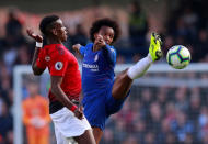 Soccer Football - Premier League - Chelsea v Manchester United - Stamford Bridge, London, Britain - October 20, 2018 Manchester United's Paul Pogba in action with Chelsea's Willian Action Images via Reuters/Andrew Couldridge