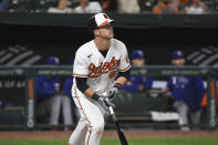 Baltimore Orioles' Ryan Mountcastle (6) watches his fifth inning solo home run hit against Texas Rangers starting pitcher Glenn Otto during a baseball game Thursday, Sept. 23, 2021, in Baltimore. (AP Photo/Terrance Williams)