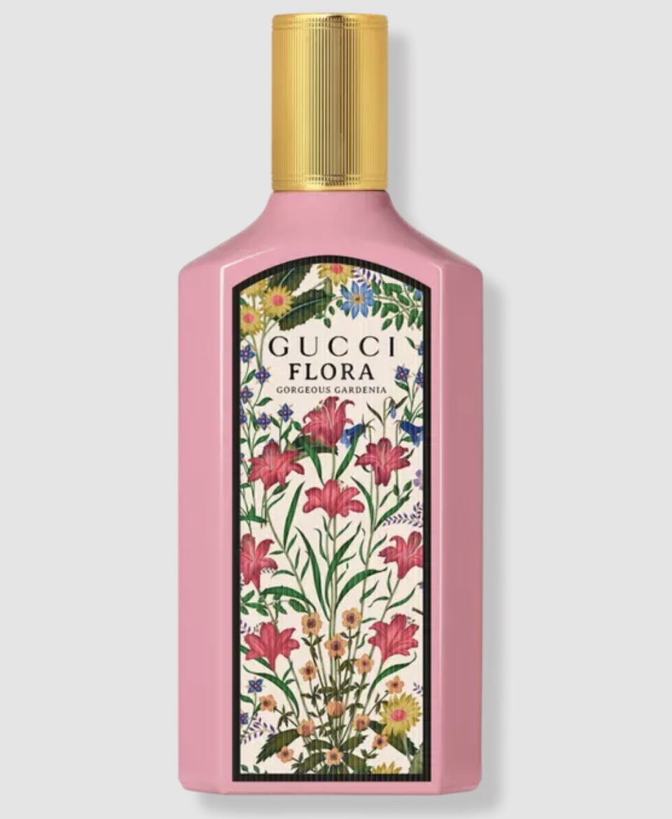 pink bottle of floral perfume