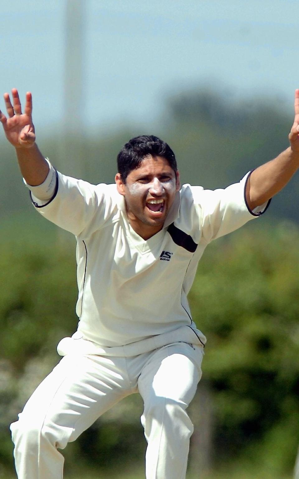 Bowler for Wood Lane Mustafa Bashir appeals to the umpire - Credit: Stoke Sentinel / SWNS.com 