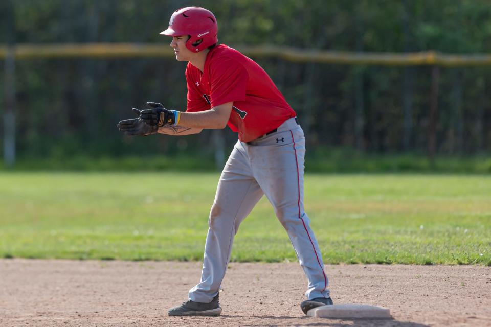 Durfee’s Ryan Lopes celebrates a RBI double on Monday against New Bedford.