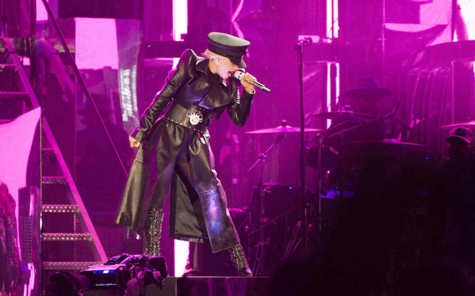 <p>Gaga began her set in a belted Mugler trench from the designer's most recent runway show.</p> <h4>Getty Images</h4>