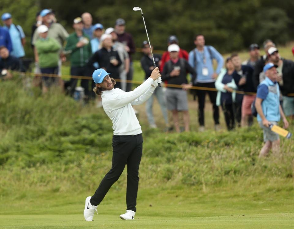 England's Tommy Fleetwood plays a shot from the 11th fairway during the third round of the British Open Golf Championships at Royal Portrush in Northern Ireland, Saturday, July 20, 2019.(AP Photo/Jon Super)