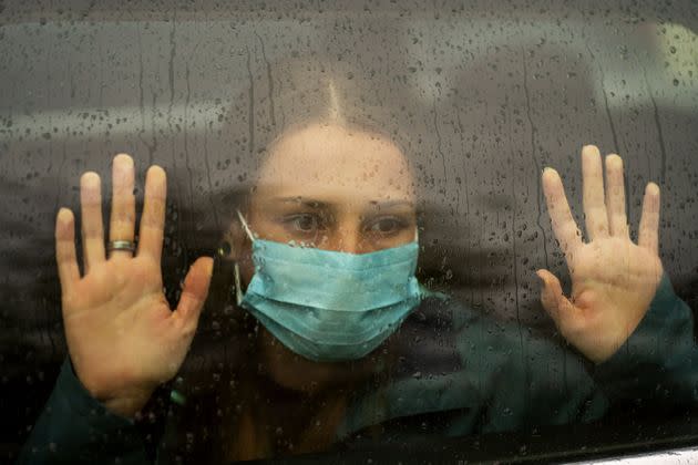 Sad woman or teenager girl looking through a steamy car window (Photo: taseffski via Getty Images)