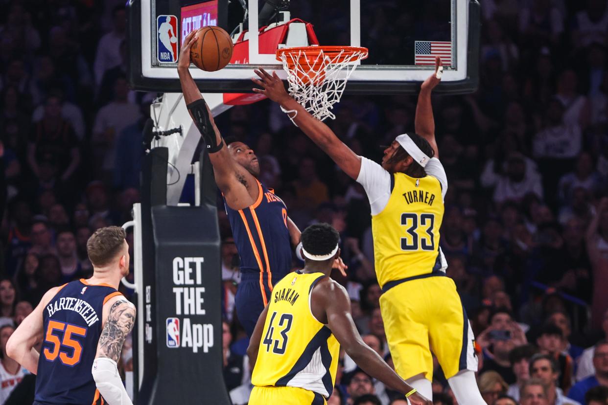 May 8, 2024; New York, New York, USA; New York Knicks forward OG Anunoby (8) attempts to dunk past Indiana Pacers center Myles Turner (33) in the first quarter during game two of the second round for the 2024 NBA playoffs at Madison Square Garden. Mandatory Credit: Wendell Cruz-USA TODAY Sports