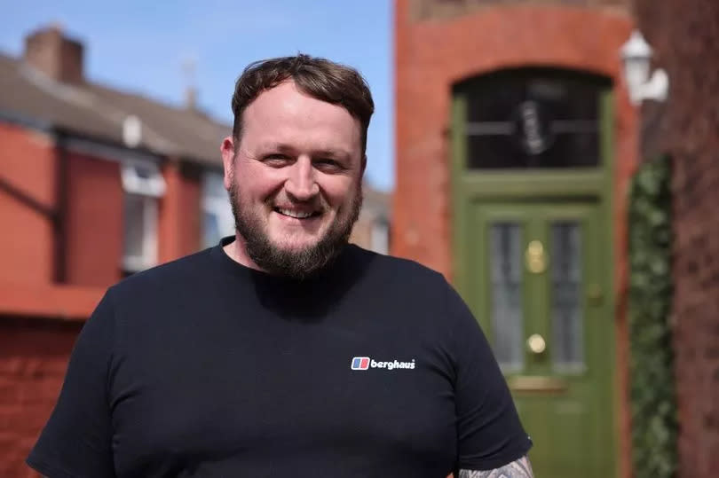 Green Party supporter Lee Morris at home in Prenton