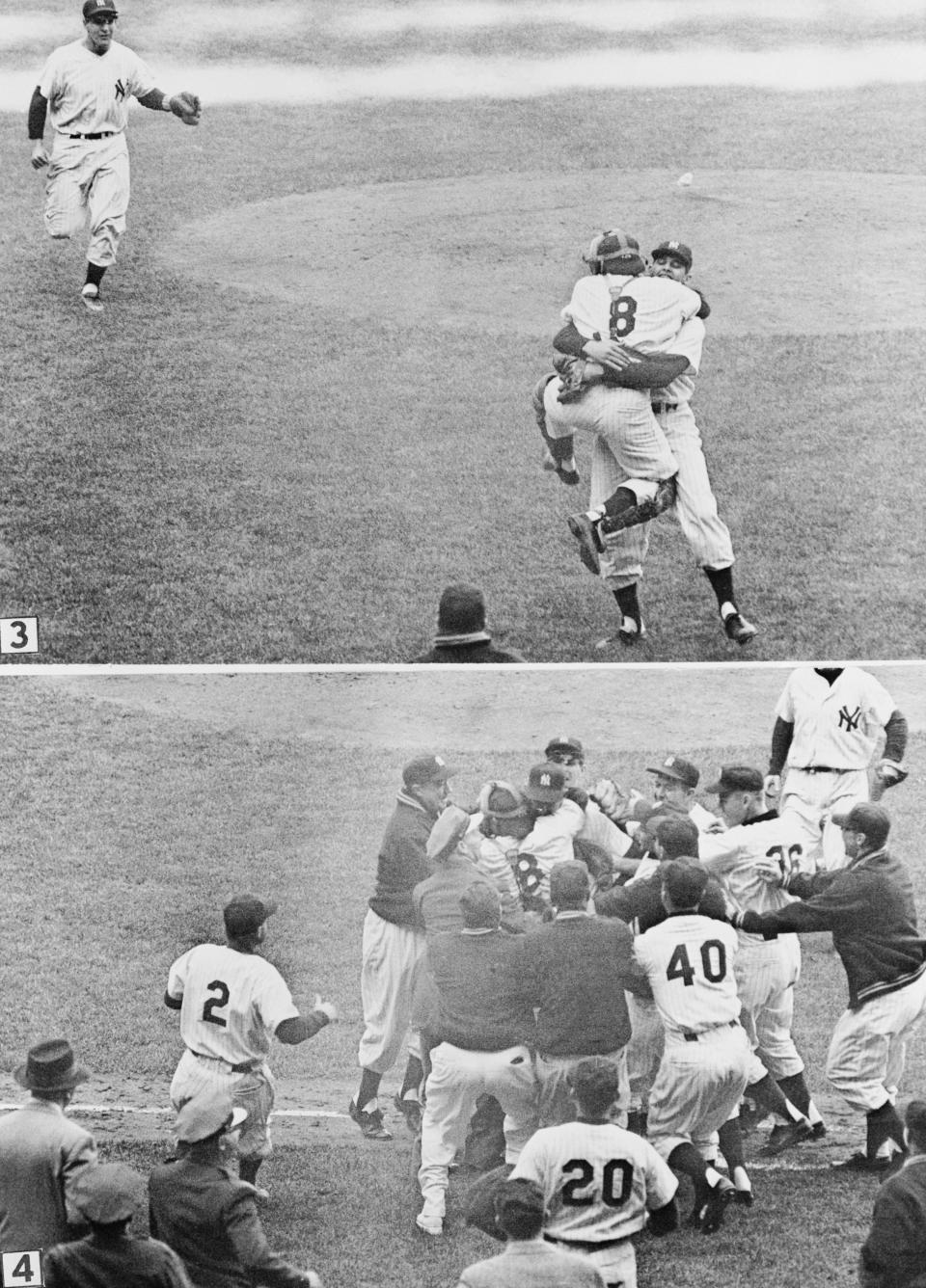 Yogi Berra jumps up and down as he hugs teammate Don Larsen, following Larsen's feat of pitching the first perfect game in World Series history in the fifth series game