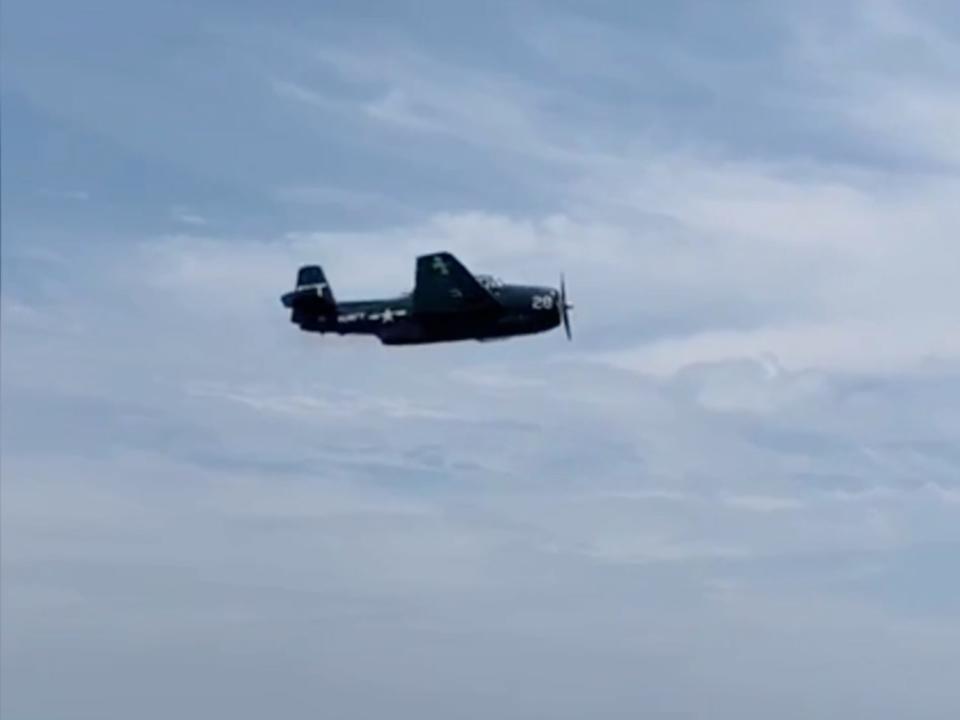 A World War II-era plane crash-landed during an air show on a Florida beach (Melanie Schrader)