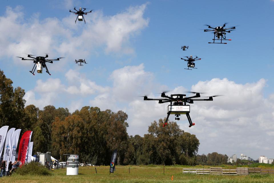 This picture taken on March 17, 2021 in the Israeli coastal city of Hadera shows several simultaneous flights of numerous unmanned aerial vehicles (UAVs, or drones) as part of the main demonstration performed by the companies who won the tender for the project.