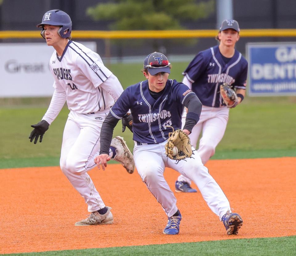 Twinsburg third baseman Kris Kimmel makes a play during a game against Hudson.