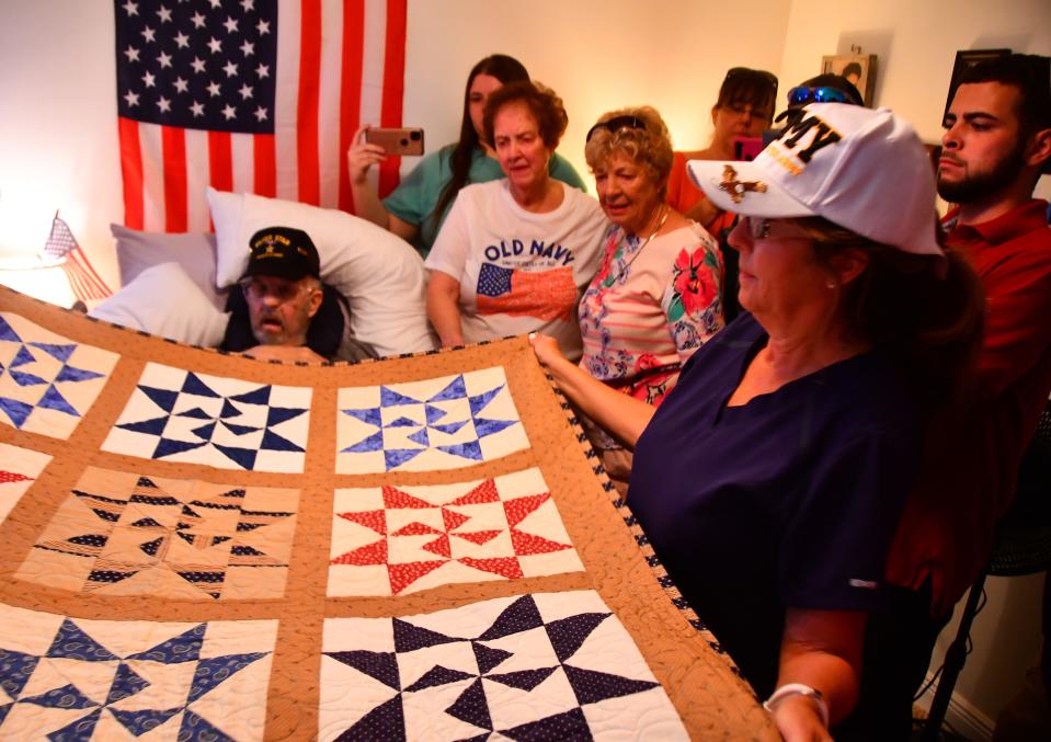 Surrounded by family, veterans, members of the Palm Bay Fire Department and Wuesthoff Brevard Hospice and Palliative Care, Vietnam vet, Silver Star recipient Marine Master Sgt. Michael Moro, retired, was honored at his Palm Bay home on Wednesday for his service. He was pinned and presented with a Valor Quilt.