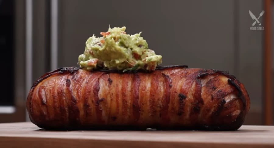 This massive bacon-wrapped breakfast burrito will leave you completely speechless
