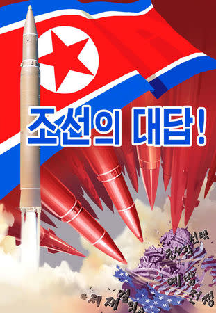 A propaganda poster blaming U.S. and hostile countries' sanction is seen in this undated photo released by North Korea's Korean Central News Agency (KCNA) in Pyongyang August 17, 2017. The poster reads: "Our answer!" KCNA/via REUTERS